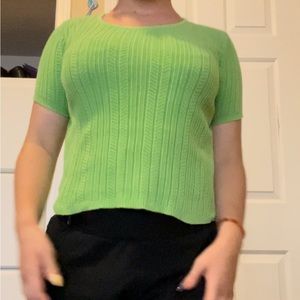 Green knitted short sleeve with a loop in the back